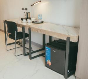 Kuchyň nebo kuchyňský kout v ubytování NS Royal Hotel