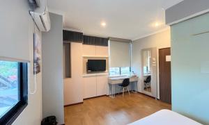 TV a/nebo společenská místnost v ubytování G-Hotel Pontianak