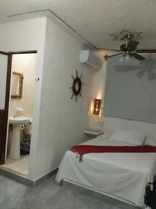 Postel nebo postele na pokoji v ubytování QUINTA DIAMANTE villas&hotel