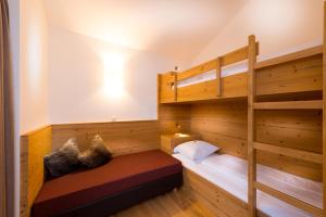 Postel nebo postele na pokoji v ubytování Hotel Dorfer