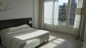 Postel nebo postele na pokoji v ubytování Residence Services Calypso Calanques Plage