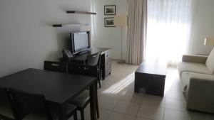 TV a/nebo společenská místnost v ubytování Residence Services Calypso Calanques Plage
