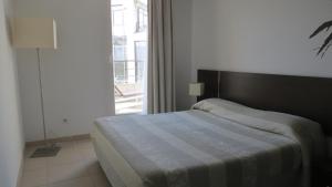 Postel nebo postele na pokoji v ubytování Residence Services Calypso Calanques Plage