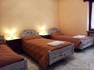 Postel nebo postele na pokoji v ubytování B&B Anna Fiera