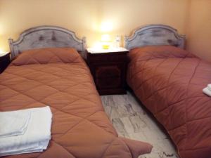 Postel nebo postele na pokoji v ubytování B&B Anna Fiera
