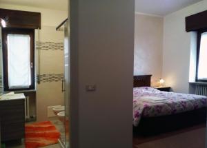 Postel nebo postele na pokoji v ubytování B&B Anna Fiera