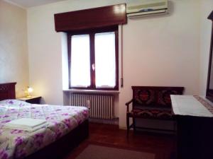 Postel nebo postele na pokoji v ubytování B&B Anna Fiera