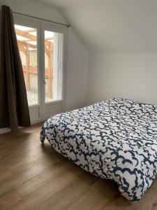 Postel nebo postele na pokoji v ubytování Spacieux appartement avec terrasse