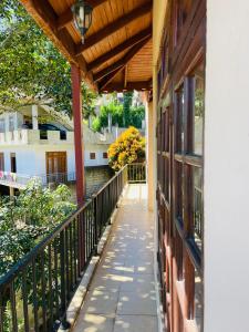 Balkón nebo terasa v ubytování Ulpatha Guest House