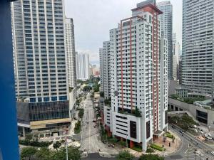 an aerial view of a city with tall buildings at Executive Suite Air Residence Style Comfort Makati 300 Mbps in Manila