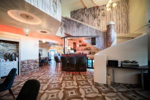 Kuchyň nebo kuchyňský kout v ubytování Hotel Zenubia