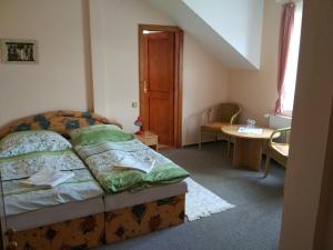 Postel nebo postele na pokoji v ubytování Pension Všeruby