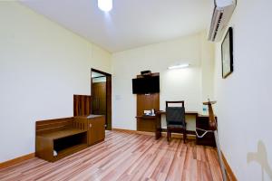 TV a/nebo společenská místnost v ubytování The Pamposh Hotel