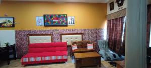 Χώρος καθιστικού στο Hasif Homestay Studio
