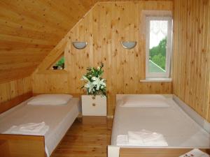 Postel nebo postele na pokoji v ubytování Eco Boutique Guest House Celmalas