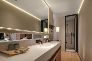 Fotografija u galeriji objekta Qingdao Wushe Yujianshanju Tangchi Seaview Hotel u gradu Ćingdao