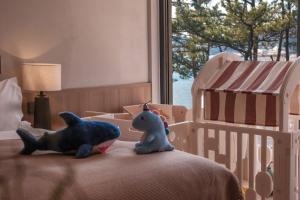 青岛Qingdao Wushe Yujianshanju Tangchi Seaview Hotel的相册照片