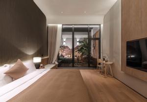 青岛Qingdao Wushe Yujianshanju Tangchi Seaview Hotel的相册照片