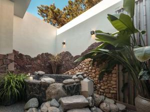 青岛Qingdao Wushe Yujianshanju Tangchi Seaview Hotel的相册照片