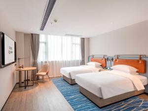 Kép Echarm Hotel Guangzhou Baiyun Airport Huadu Plaza Branch szállásáról Huatuban a galériában