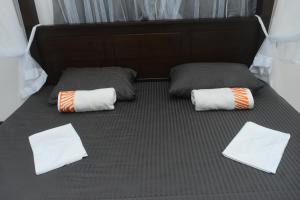 Postel nebo postele na pokoji v ubytování MANJU Homestay Unawatuna