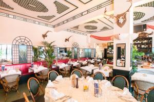 Restavracija oz. druge možnosti za prehrano v nastanitvi Hotel Au Repos Des Chasseurs