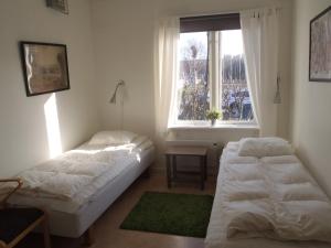 
Säng eller sängar i ett rum på Hav & Logi Skärhamn
