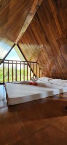 Postel nebo postele na pokoji v ubytování Nanay Eustiquia Complex Beach Resort