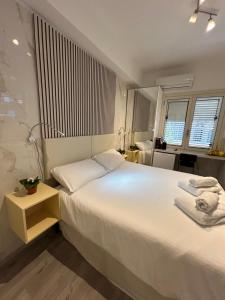Postel nebo postele na pokoji v ubytování B&B Confort