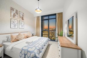 Krevet ili kreveti u jedinici u okviru objekta FIRST CLASS 2BR Mesmerizing Creekfront Views