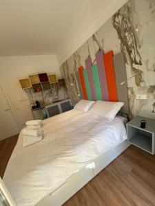 A bed or beds in a room at Confort Suites