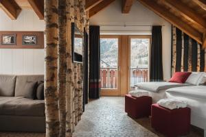 Posedenie v ubytovaní Alpen Hotel Chalet