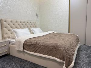 Postel nebo postele na pokoji v ubytování Modern Spaces 7