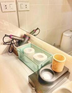 a bathroom with a mirror and a toilet on a counter at Casa de Amor in Kaybagal +13 photos