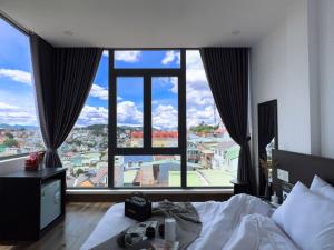 Giường trong phòng chung tại Dốc View Home +33 ảnh