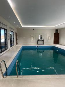 Πισίνα στο ή κοντά στο Al-Rimal