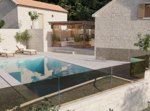 a swimming pool in the backyard of a house at Villa Marina in Metković
