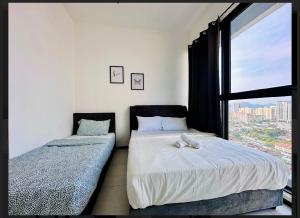 Giường trong phòng chung tại relax family stay 3BR 10pax urban +18 ảnh