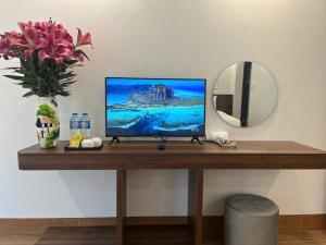 TV a/nebo společenská místnost v ubytování Sapa Warm Hotel