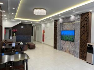 TV a/nebo společenská místnost v ubytování Sapa Warm Hotel