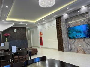 TV a/nebo společenská místnost v ubytování Sapa Warm Hotel