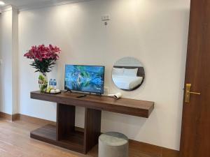 TV a/nebo společenská místnost v ubytování Sapa Warm Hotel