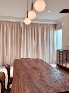 Rúm í herbergi á 麋宿Mi House墾丁包棟