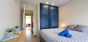 Postel nebo postele na pokoji v ubytování Appartement Au calme Quiberon