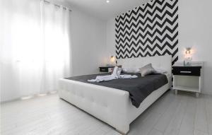 Postel nebo postele na pokoji v ubytování Villa Luna Sol