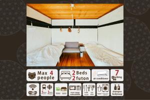 Postel nebo postele na pokoji v ubytování hinatabocco guesthouse