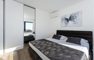 Postel nebo postele na pokoji v ubytování Villa Carpe Diem