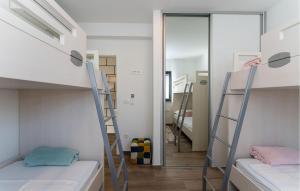 Postel nebo postele na pokoji v ubytování Villa Carpe Diem