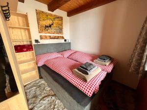 Voodi või voodid majutusasutuse Chalet Bergdoktor toas
