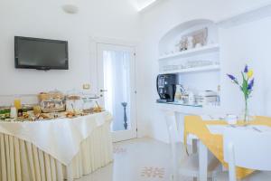 A cozinha ou kitchenette de Dimora Dell'Osanna
